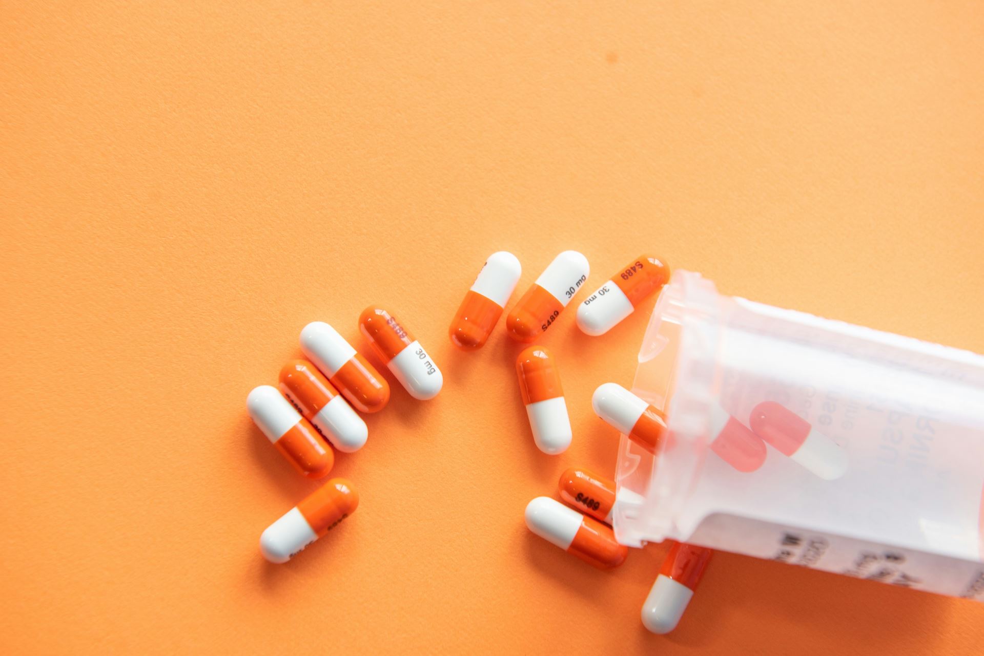 prescription medication tablets tipped out on a table
