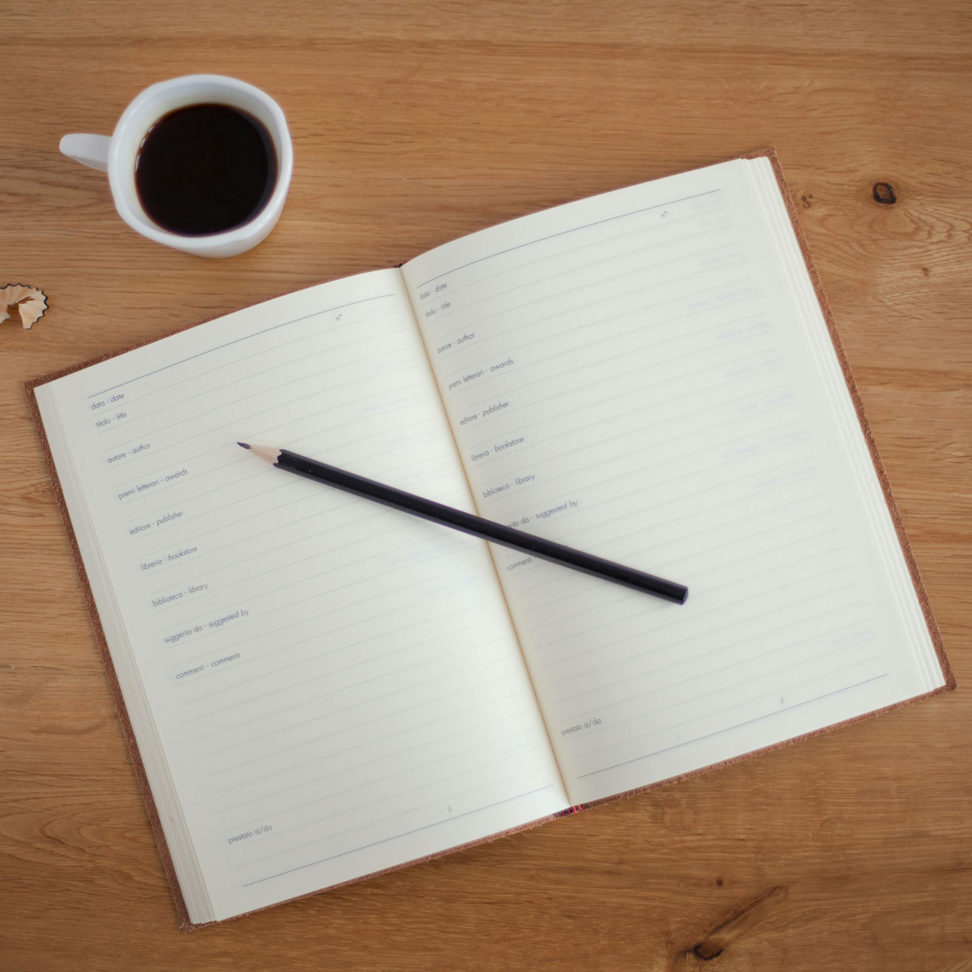 appointment book opened with pencil ready to write in 